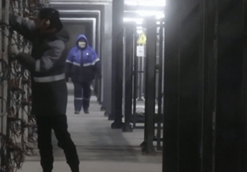 Workers at a BitRiver Bitcoin mining data center in Siberia, Russia.